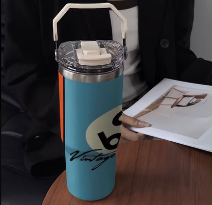 Blue and orange tumbler with lid