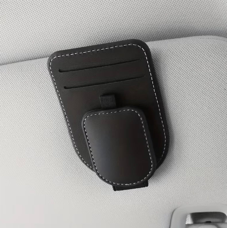 Black car sun visor eyeglass holder