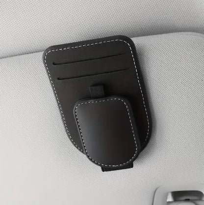 Black car sun visor eyeglass holder