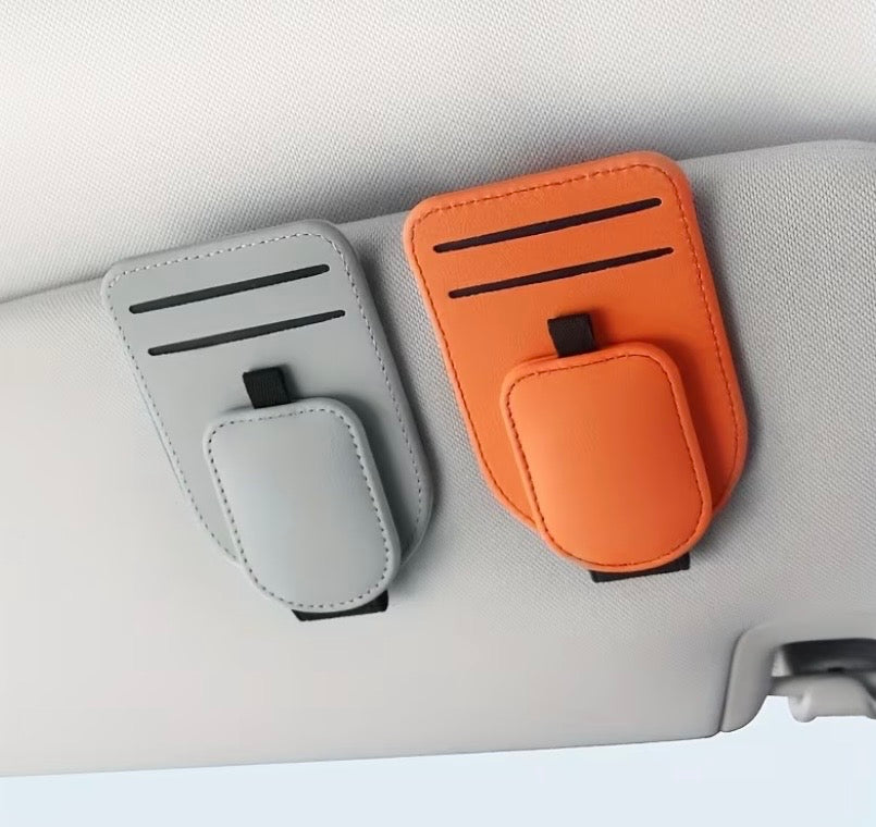 Car eyeglass holders in white and orange