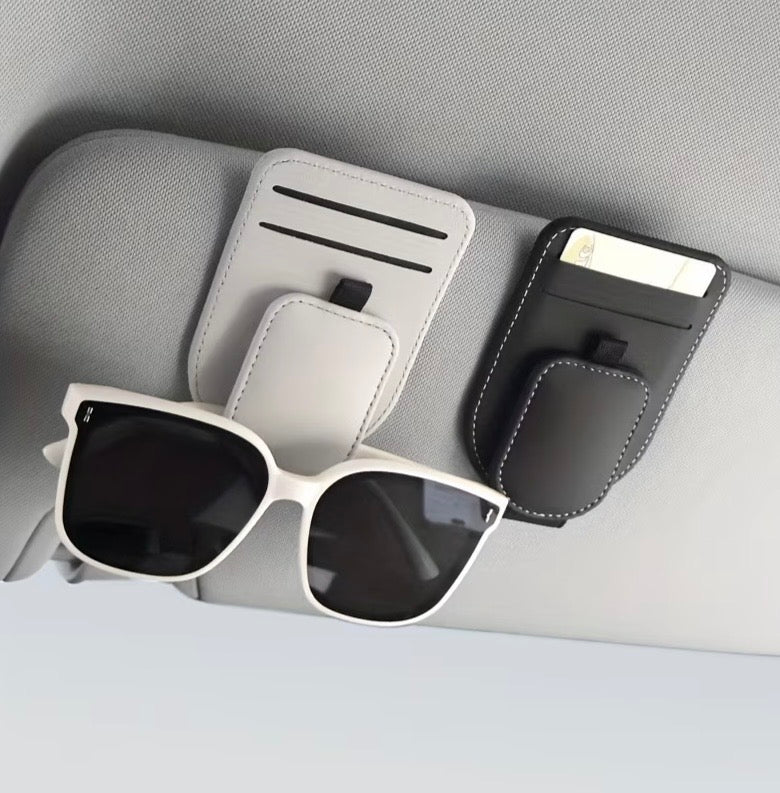 Car sun visor eyeglass holder with sunglasses