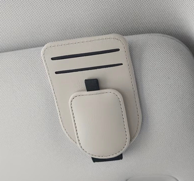 White car visor eyeglass holder detail